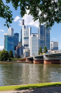Skyline with skyscrapers in the city centre, river Main and Untermainbrücke in Frankfurt, Germany,