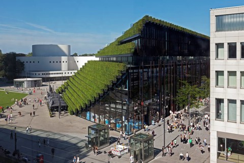 View of Kö-Bogen II with green façade, planted with 30, 000 hornbeams, ecological architecture to