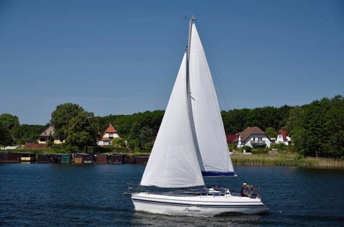 Europe, Germany, Mecklenburg-Western Pomerania, island town of Malchow, Lake Malchow, sailing boat,