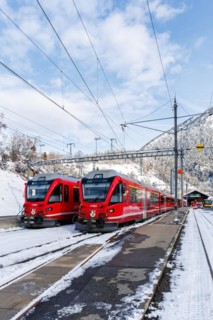 Rhaetian Railway trains on the Albula railway Stadler Rail passenger train at Filisur station,