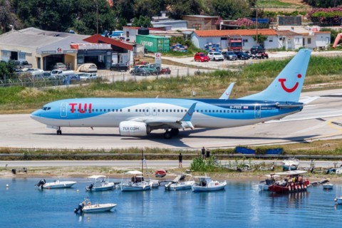 A TUI Airways Boeing 737-800 aircraft with the registration G-FDZZ at Skiathos Airport, Greece,