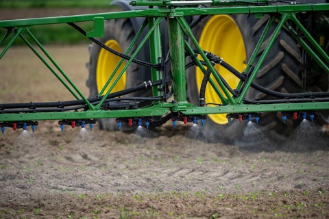 Agriculture, pesticide being sprayed on a field, sugar beet seedlings, North Rhine-Westphalia,