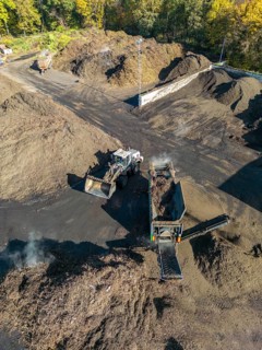 Composting plant, organic waste is composted, sorted by size, smaller parts are reused as compost,