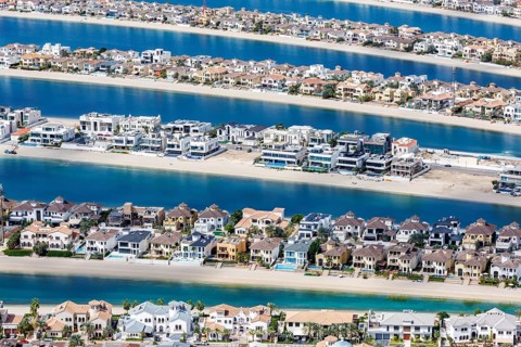 Artificial island in the shape of a palm tree The Palm Jumeirah with luxury villas and beachfront