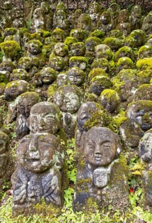 Moss-covered stone statues of rakans, the disciples of Buddha, Otagi Nenbutsu-ji temple, Kyoto,