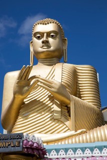 Giant Golden Buddha statue at Dambulla cave temple complex, Sri Lanka, Asia