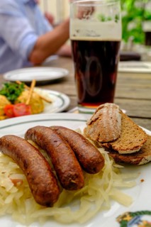 Smoked beer, and sausages with cabbage, food, Schlenkerla, the historic smoked beer brewery,