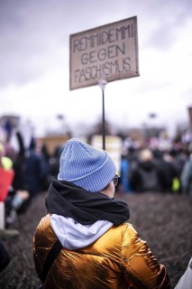 150, 000 people gather around the Bundestag in Berlin to build a human wall against the shift to