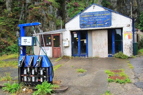 Closed filling station garage, Blaenau Ffestiniog, Gwynedd, north Wales, UK