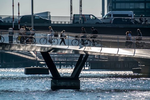 Cyclists on the Lille Langebro cycle and pedestrian bridge over the harbour, Copenhagen is