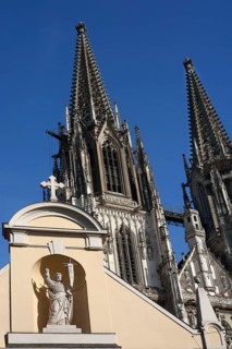 Sculpture of Christ at St John's Chapel, completely rebuilt in 1766, on the right a tower of St