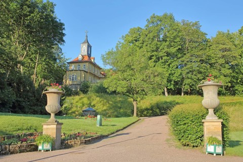 Baroque tea palace and lidded vases in the palace park, pleasure palace, English garden, building,