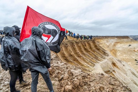 Many thousands of demonstrators march after a demonstration against the demolition of the lignite