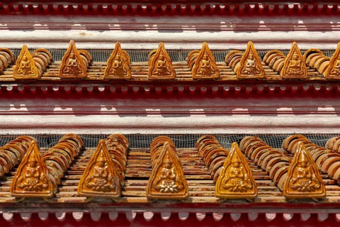 Roof decoration at the Uposatha Hall, Ubosot, the roof is staggered in three tiers and covered with
