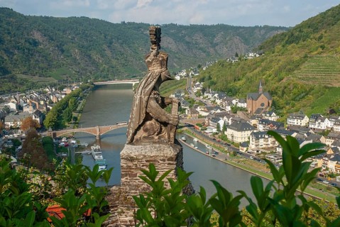 Statue at Reichsburg Castle and view of the Mosel Valley at Cochem, Rhineland-Palatinate, Germany,