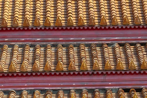 Roof decoration at the Uposatha Hall, Ubosot, the roof is staggered in three tiers and covered with