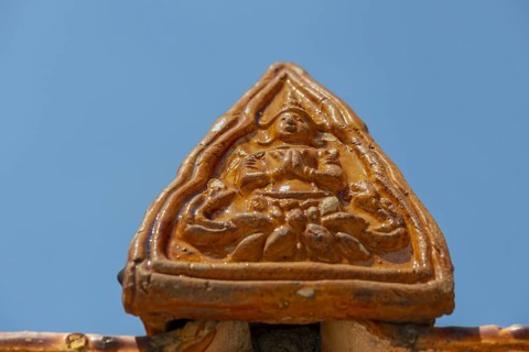 Roof decoration at the Uposatha Hall, Ubosot, the roof is staggered in three tiers and covered with