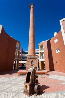 Chimney of industry in Portimao, Algarve, Portugal, Europe