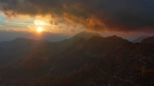Aerial view of spectacular sunset on the mountain valley. Beautiful view in Durmitor National Park,