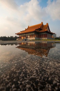 A water reflection of the National Concert Hall in Liberty Square of downtown Taipei