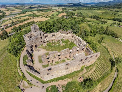 Aerial view of castle Staufen, ruin on hill at village Staufen, south of Freiburg Breisgau,