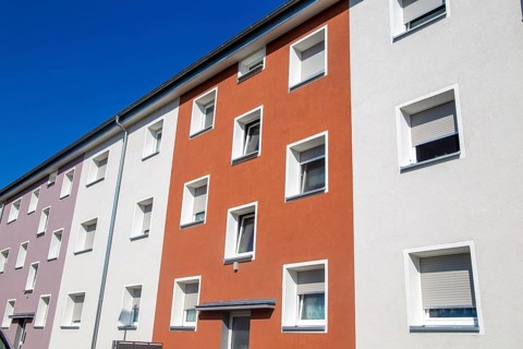 Old apartment block with new façade paint