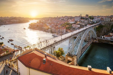 View of Porto city and Douro river and Dom Luis bridge I from famous tourist viewpoint Miradouro da