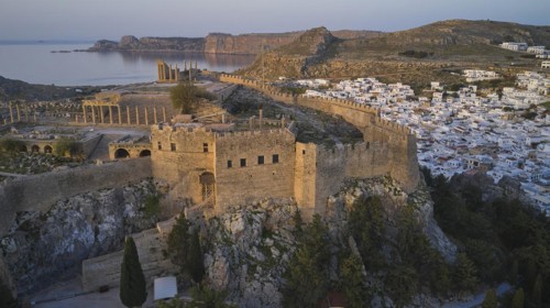 Drone shot, first morning light, Lindos, Acropolis of Lindos, Propylaea with open staircase,
