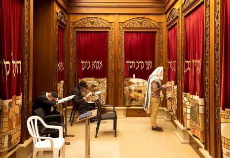 Jerusalem, Israel, 15 April, 2022: Orthodox jews is praying in synagogue near Sacred Western