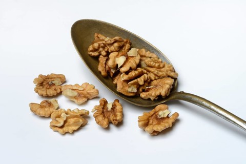 Walnut, Juglans regia, walnuts in spoons