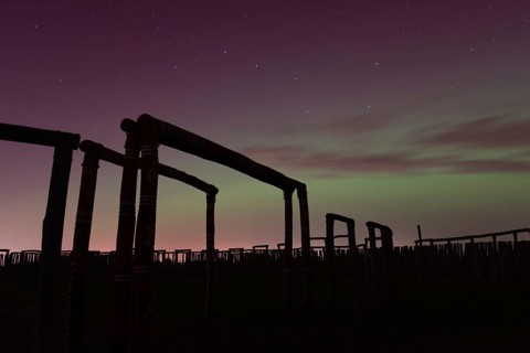 Northern lights (aurora borealis) over the ring sanctuary of Pömmelte, prehistoric circular ditch
