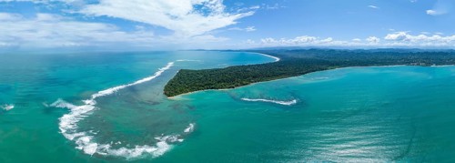 Turquoise sea, aerial view, view of Cahuita National Park, coast and coastal landscape with forest,