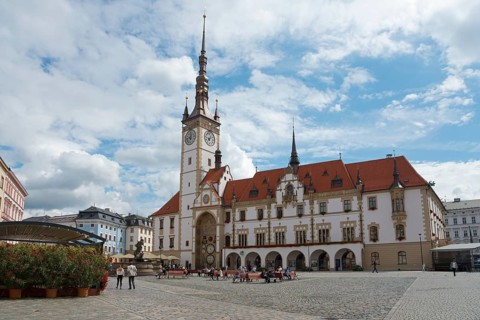 View of a historic town hall with clock tower on a cloudy day on an empty square, Town Hall,