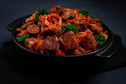 Bigos, bigus is a national Polish dish, made of cabbage and meat, stewed, homemade, no people