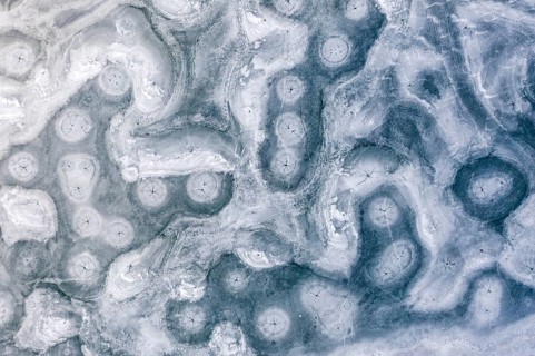 Aerial view of ice formations on a frozen lake, winter, Riegsee, Alpine foothills, Upper Bavaria,