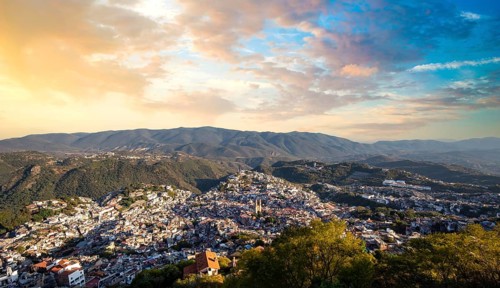 Mexico, Taxco city lookout overlooking scenic hills and colorful colonial historic city center,