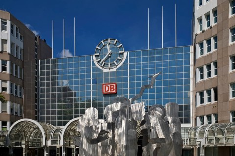 A stainless steel figure group at the main railway station entitled The Ring by Horst Antes,