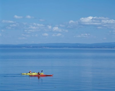 Sea Kayakers on Saint-Lawrence River in summer, Port-au-Persil, Charlevoix, Quebec, Canada, North