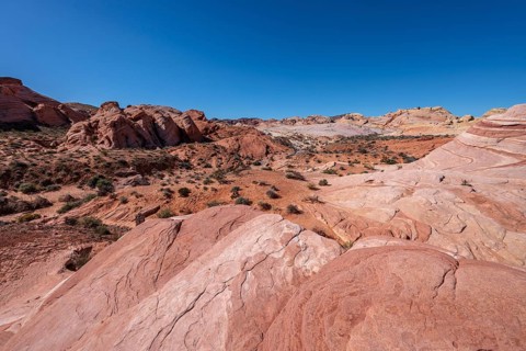 Layered rock formations along the Fire Wave Trail at Valley of Fire State Park near Overton, Nevada