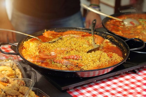 Paella preparation, street market stand near Barcelona Cathedral square