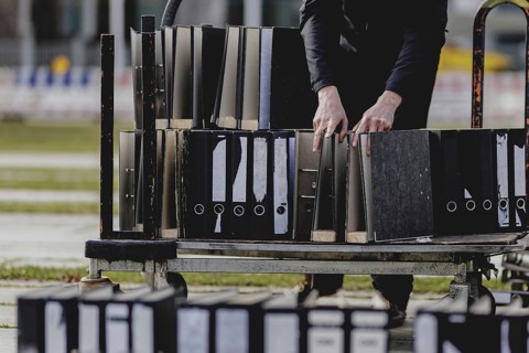 Files are cleared away after a protest action by the German Confederation of Skilled Crafts in