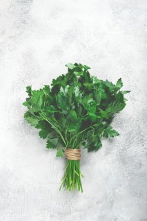 Bunch of parsley, on the table, top view, no people
