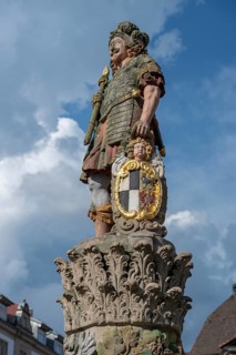 Figure of a medieval town servant on the Zinsfeld fountain, Holzmarkt, Kulmbach, Upper Franconia,