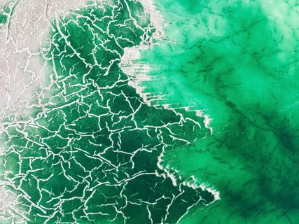 Detail of a toxic phosphogypsum waste pond in the vicinity of the town of Huelva. Aerial view.