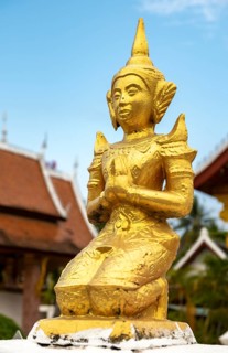 Deity statue, Wat Sensoukaram, Luang Prabang, Laos, Asia