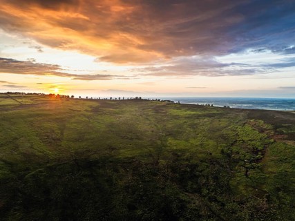 Sunset over Cod Beck Reservoir from a drone, North York Moors National Park, North Yorkshire,