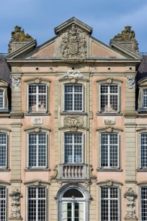 Façade with high relief architectural ornaments above windows of 1750 Poeke Castle, Kasteel van
