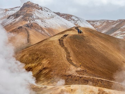 Steaming hot springs and colourful rhyolite mountains, hiking path, Hveradalir geothermal area,