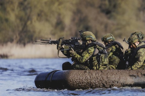 Soldiers on an inflatable boat, taken as part of the military exercise 'Wettiner Schwert' with