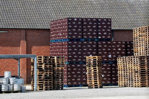 Stacked beer crates at trappist Abbey of Westmalle, Flemish monastery of Cistercians and brewery in